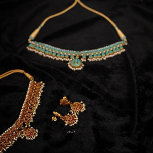 Set of traditional kundan jewellery including a necklace and earrings