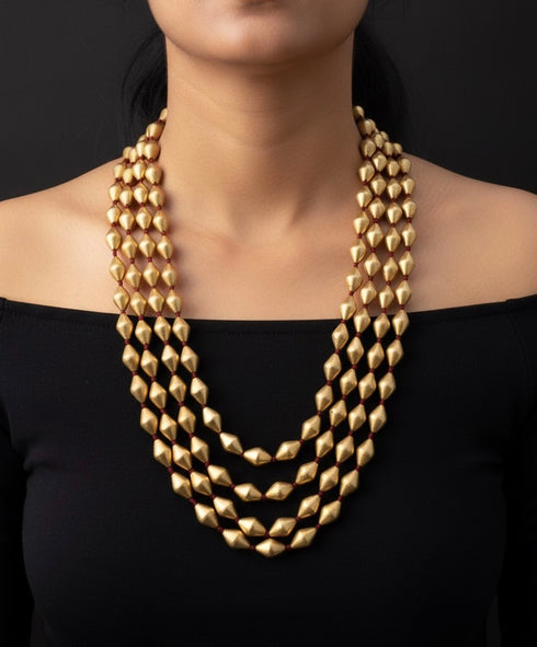 Gold Dholki 4 line Necklace
