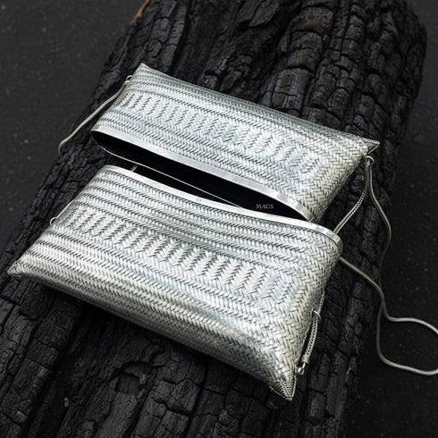 Silver woven clutch bag with chain