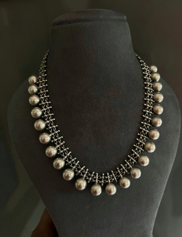 Tribal silver ball necklace