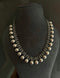 Tribal silver ball necklace