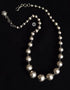 Silver graduated ball necklace