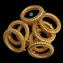 A collection of indian gold plated flexible sutlada kadas (gold bangles) with a detailed, textured design by macs jewelry