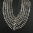 A multi strand 925 silver statement necklace with textured metallic spikes and geometric links