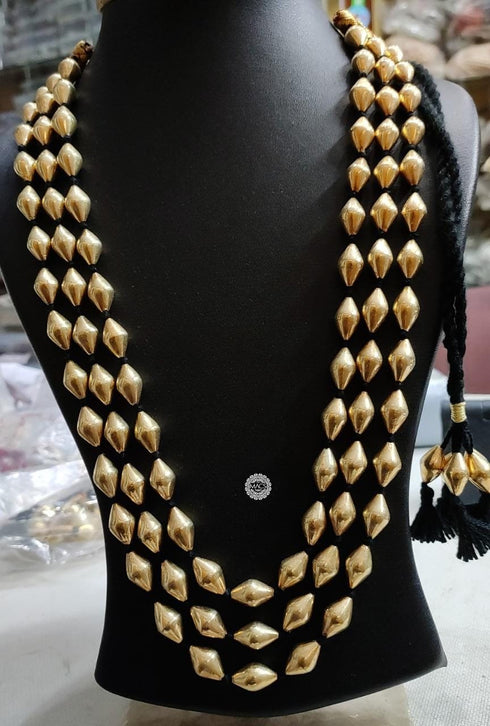 Three Line Gold Dholki Necklace in black thread