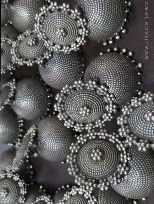 suryakanthi bold statement pure silver jhumka earrings