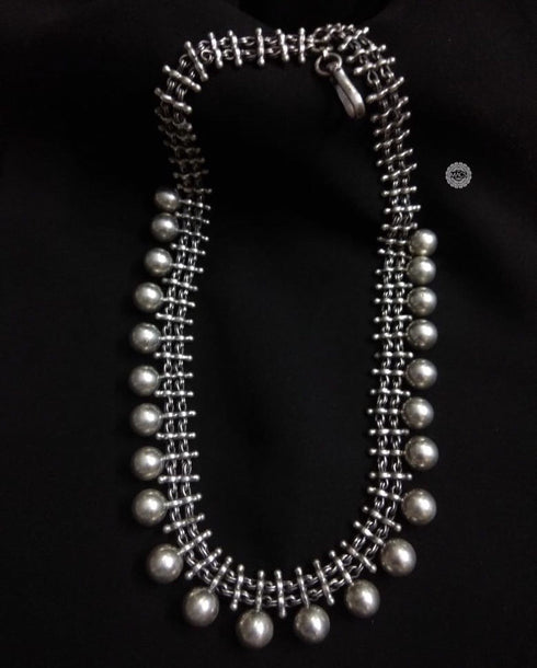 Tribal silver ball necklace
