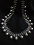 Tribal silver ball necklace